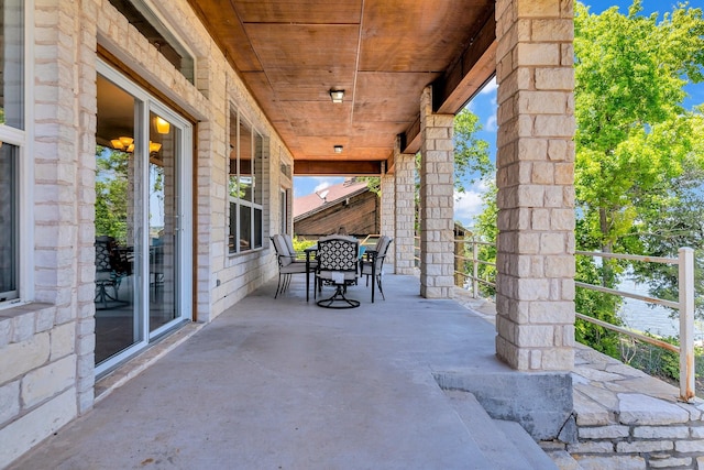 6107 Grande Cove Ct, Granbury, TX 76049 - view of patio featuring outdoor dining area