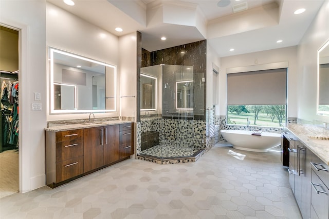 1505 Cottonwood Valley Cir N, Irving, TX 75038 - full bath with vanity, a shower stall, a freestanding bath, recessed lighting, and a walk in closet