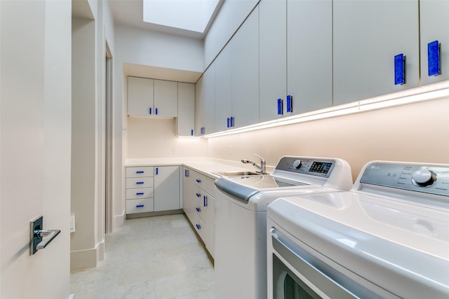 1505 Cottonwood Valley Cir N, Irving, TX 75038 - washroom featuring washing machine and dryer, cabinet space, and a skylight