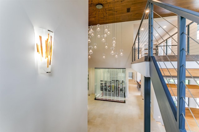 1505 Cottonwood Valley Cir N, Irving, TX 75038 - staircase featuring a towering ceiling and wooden ceiling