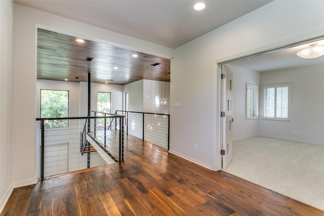 1505 Cottonwood Valley Cir N, Irving, TX 75038 - empty room featuring wood finished floors, recessed lighting, healthy amount of natural light, and baseboards