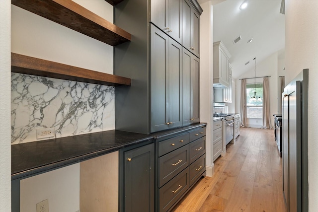 kitchen featuring decorative backsplash, visible vents, open shelves, stainless steel appliances, and light wood-style flooring