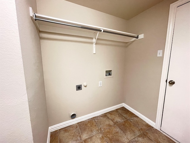 3617 Timothy Dr, Flower Mound, TX 75022 - clothes washing area with laundry area, electric dryer hookup, dark tile patterned floors, washer hookup, and baseboards