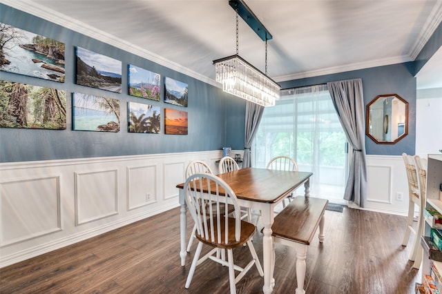 2914 Harvard St, Irving, TX 75062 - dining space featuring an inviting chandelier, dark wood-style floors, a wainscoted wall, and a decorative wall