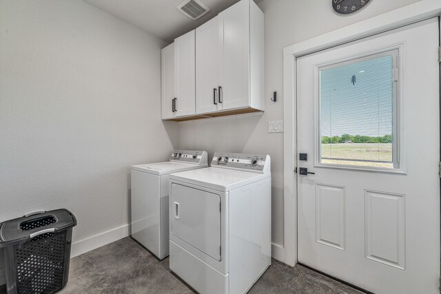 1400 Lacy Dr, Lipan, TX 76462 - clothes washing area with washing machine and dryer, visible vents, cabinet space, and baseboards