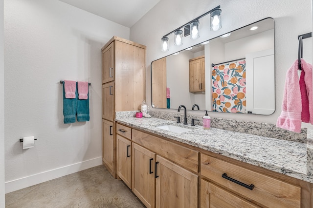 1400 Lacy Dr, Lipan, TX 76462 - bathroom with concrete floors, vanity, and baseboards