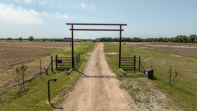 1400 Lacy Dr, Lipan, TX 76462 - view of street with a rural view, driveway, and a gated entry