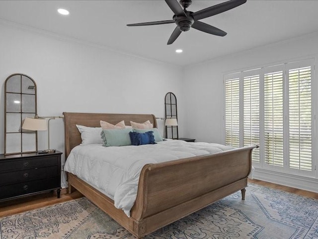 8313 Jonquil Dr, Waco, TX 76708 - bedroom with crown molding, recessed lighting, a ceiling fan, and wood finished floors