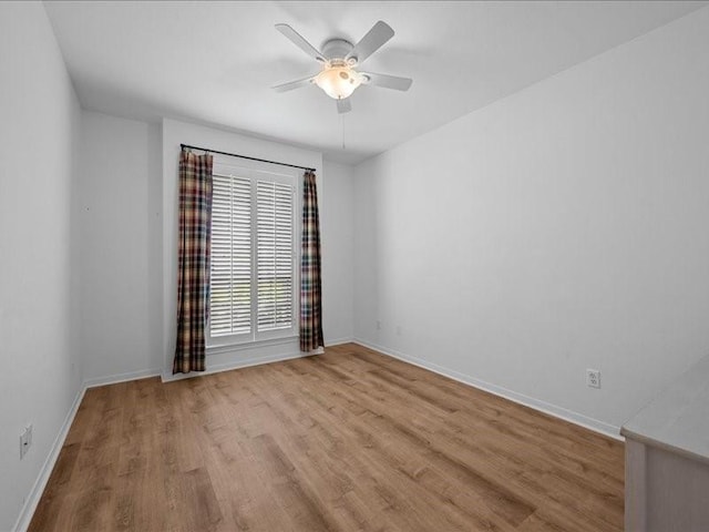 8313 Jonquil Dr, Waco, TX 76708 - unfurnished room featuring baseboards, ceiling fan, and wood finished floors