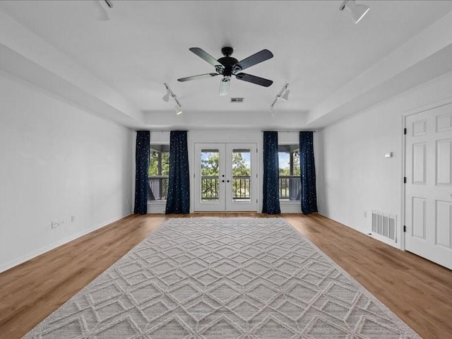 8313 Jonquil Dr, Waco, TX 76708 - unfurnished room with a ceiling fan, french doors, rail lighting, and visible vents
