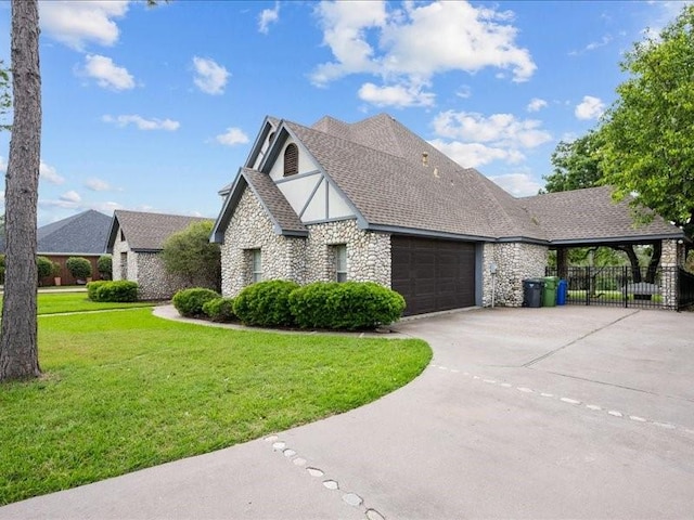 8313 Jonquil Dr, Waco, TX 76708 - view of home's exterior with a garage, fence, stone siding, a yard, and driveway