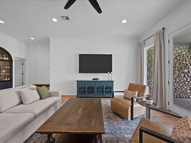 8313 Jonquil Dr, Waco, TX 76708 - living area featuring crown molding, a ceiling fan, recessed lighting, and visible vents