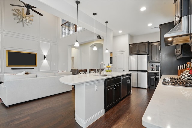641 Mangrove Trl, Saginaw, TX 76131 - kitchen featuring ceiling fan, a sink, stainless steel appliances, open floor plan, and dark wood-type flooring