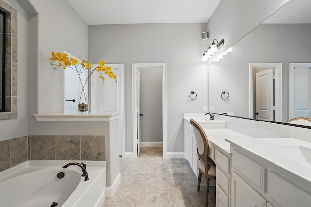 641 Mangrove Trl, Saginaw, TX 76131 - full bath with a sink, baseboards, a garden tub, and double vanity