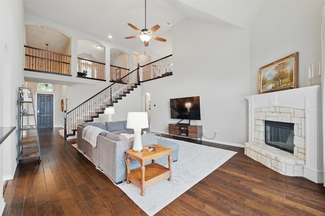 3401 Wentworth Way, Highland Village, TX 75077 - living area featuring stairs, high vaulted ceiling, dark wood finished floors, a ceiling fan, and a fireplace