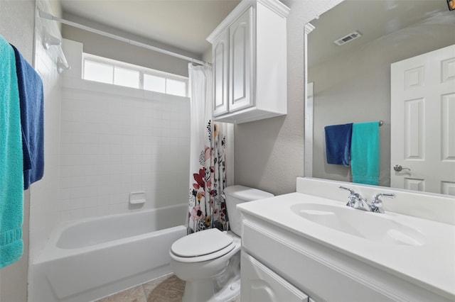 bathroom with visible vents, vanity, tile patterned floors, toilet, and shower / tub combo with curtain