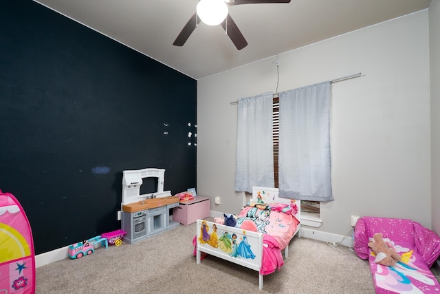 recreation room featuring a ceiling fan and carpet flooring
