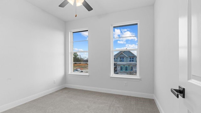 1620 Keneipp Rd, Carrollton, TX 75006 - empty room with light colored carpet, baseboards, and a ceiling fan
