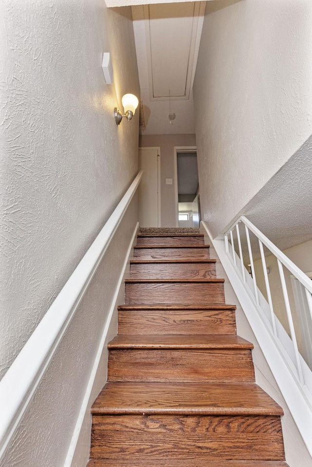 4109 Orchard Hill Dr, Arlington, TX 76016 - stairs featuring attic access and a textured wall