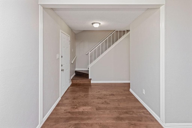 4109 Orchard Hill Dr, Arlington, TX 76016 - entrance foyer with stairway, wood finished floors, and baseboards