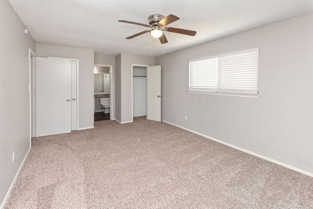 4109 Orchard Hill Dr, Arlington, TX 76016 - unfurnished bedroom featuring a textured ceiling, baseboards, carpet floors, and ensuite bath