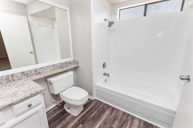 4109 Orchard Hill Dr, Arlington, TX 76016 - full bathroom with wood finished floors, toilet, shower / bath combination, vanity, and baseboards