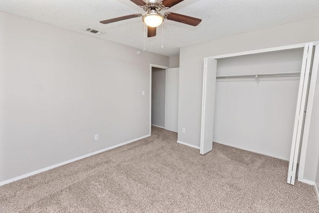 4109 Orchard Hill Dr, Arlington, TX 76016 - unfurnished bedroom with a closet, a ceiling fan, visible vents, carpet, and a textured ceiling