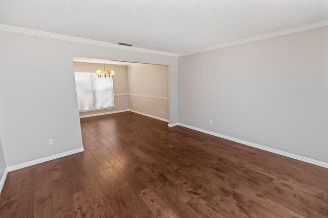 4109 Orchard Hill Dr, Arlington, TX 76016 - empty room featuring a textured ceiling, visible vents, baseboards, dark wood-style flooring, and a notable chandelier