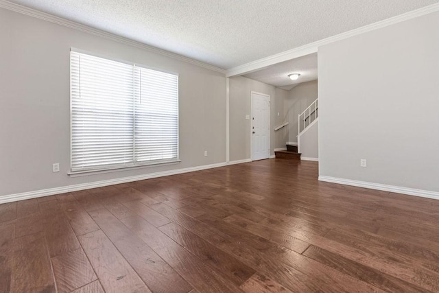 4109 Orchard Hill Dr, Arlington, TX 76016 - unfurnished living room featuring stairs, baseboards, ornamental molding, a textured ceiling, and hardwood / wood-style floors