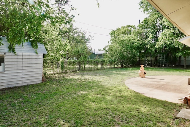 view of yard with a fenced backyard and a patio area