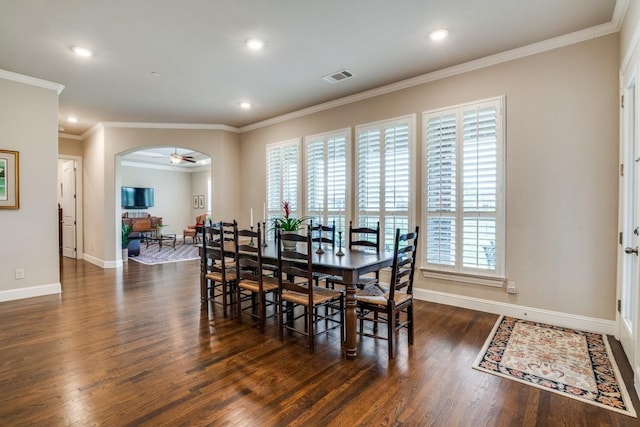 1415 Aberdeen Dr, Lucas, TX 75002 - dining area featuring visible vents, arched walkways, wood finished floors, and a wealth of natural light