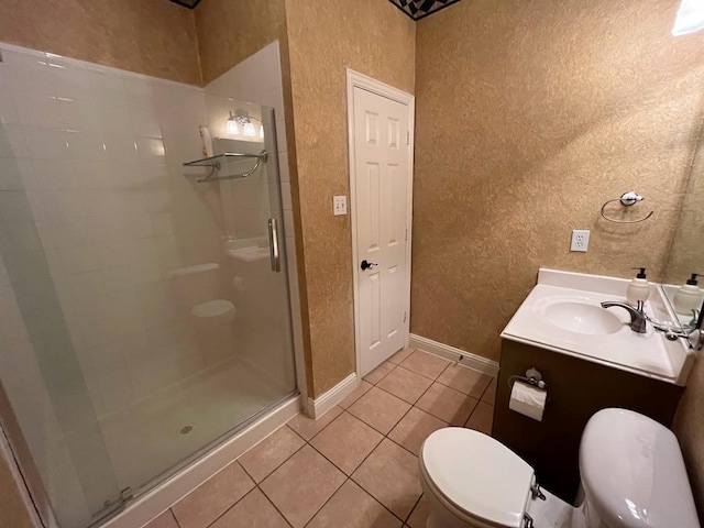 104 Misty Glen Ln, Murphy, TX 75094 - bathroom with tile patterned floors, a textured wall, toilet, and a shower stall