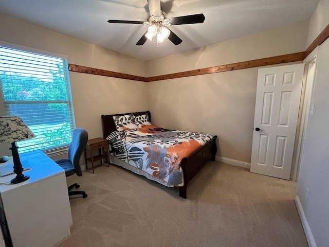 104 Misty Glen Ln, Murphy, TX 75094 - bedroom with baseboards, ceiling fan, and light colored carpet
