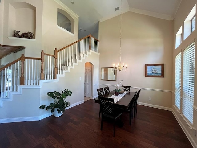 104 Misty Glen Ln, Murphy, TX 75094 - dining space with stairway, visible vents, a chandelier, wood finished floors, and high vaulted ceiling