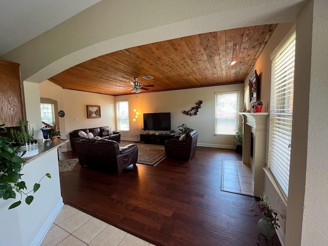 104 Misty Glen Ln, Murphy, TX 75094 - tiled living room featuring a ceiling fan, a wealth of natural light, and wood ceiling