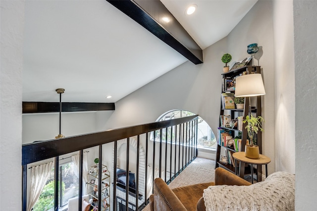 corridor featuring beam ceiling, recessed lighting, and a healthy amount of sunlight