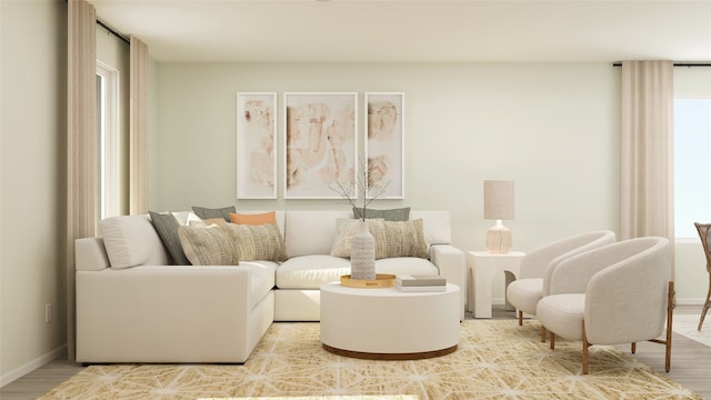 sitting room featuring wood finished floors and baseboards