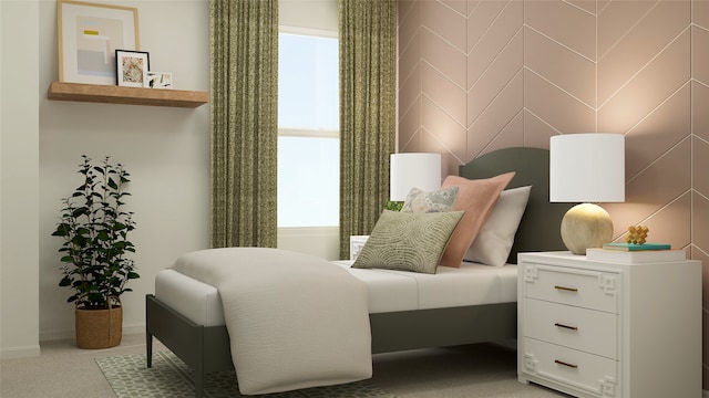 sitting room featuring baseboards and light colored carpet