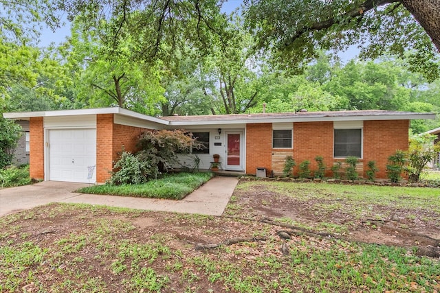 1207 W Tucker Blvd, Arlington, TX 76013 - single story home with a garage, concrete driveway, and brick siding