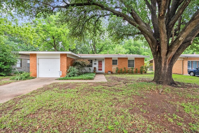 1207 W Tucker Blvd, Arlington, TX 76013 - ranch-style home featuring concrete driveway, brick siding, and a garage