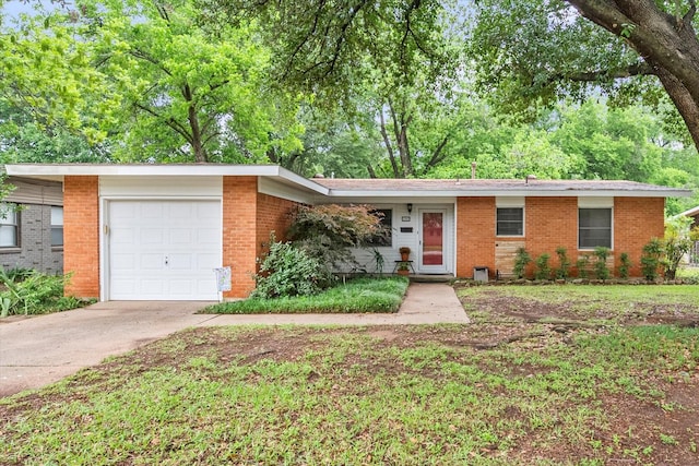 1207 W Tucker Blvd, Arlington, TX 76013 - ranch-style house featuring concrete driveway, brick siding, and an attached garage