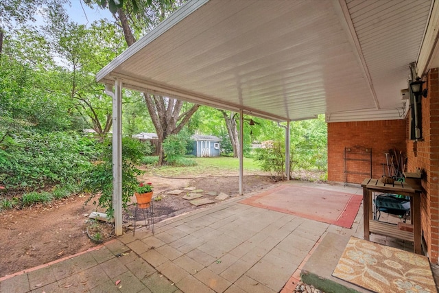 1207 W Tucker Blvd, Arlington, TX 76013 - view of patio with a storage unit and an outdoor structure