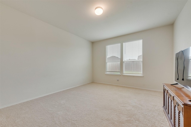 1015 Norias Dr, Forney, TX 75126 - spare room with light colored carpet and baseboards