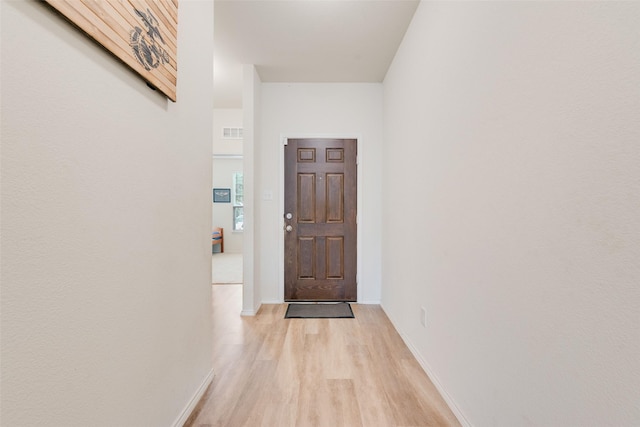 1015 Norias Dr, Forney, TX 75126 - entryway featuring light wood finished floors and baseboards