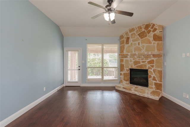 3017 Bella Lago Dr, Denton, TX 76210 - unfurnished living room featuring wood finished floors, a fireplace, baseboards, ceiling fan, and vaulted ceiling