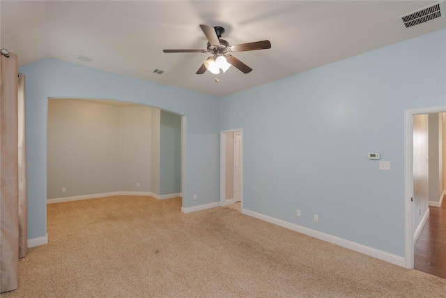 3017 Bella Lago Dr, Denton, TX 76210 - unfurnished room with a ceiling fan, visible vents, light carpet, and vaulted ceiling