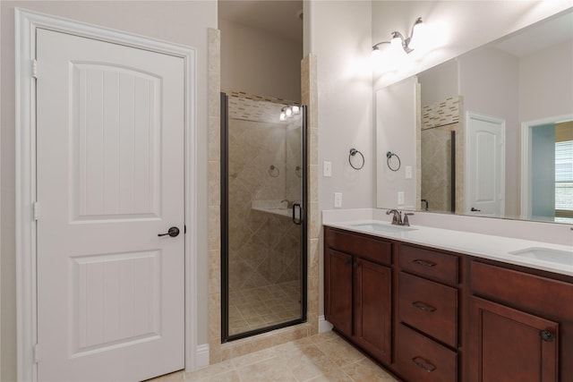 3017 Bella Lago Dr, Denton, TX 76210 - full bathroom with double vanity, a sink, and a shower stall