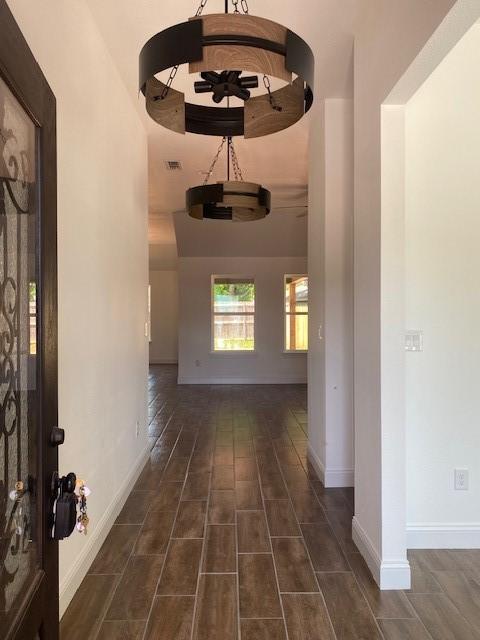1716 Oldham Ln, Abilene, TX 79602 - hall featuring visible vents and baseboards