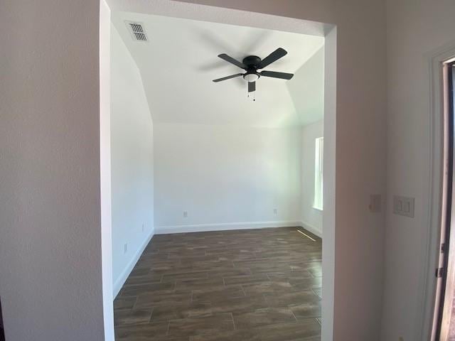 1716 Oldham Ln, Abilene, TX 79602 - empty room featuring visible vents, ceiling fan, vaulted ceiling, and baseboards
