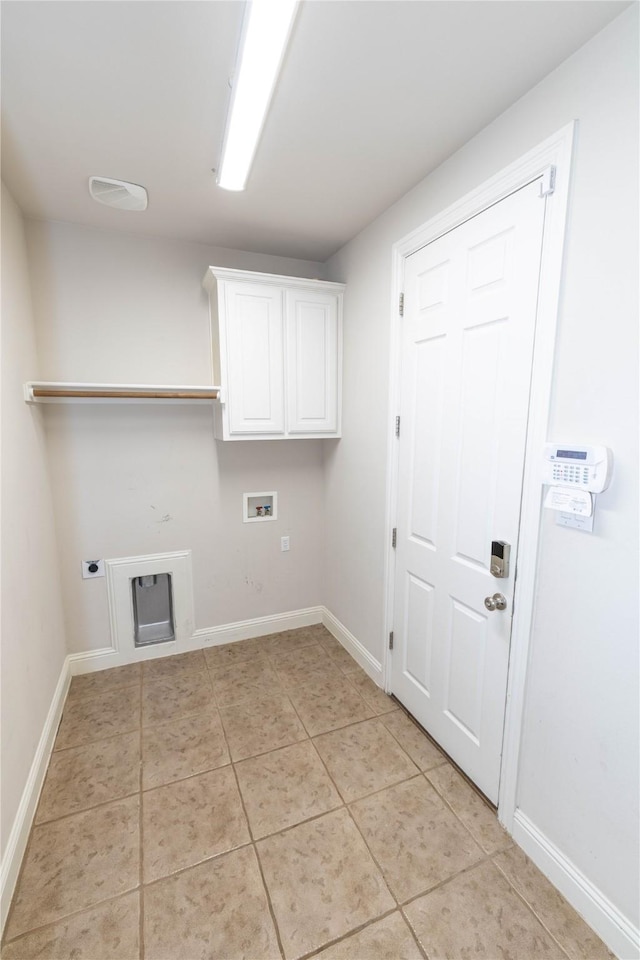 laundry area with cabinet space, washer hookup, baseboards, electric dryer hookup, and light tile patterned floors